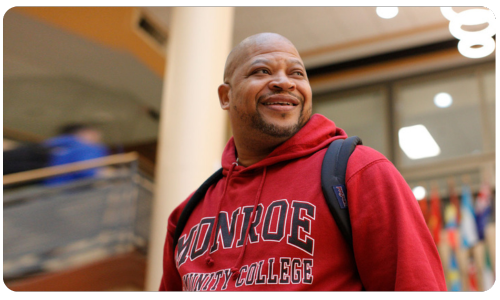 A photo of a student smiling.