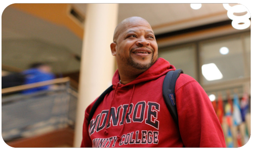 A photo of a student smiling.